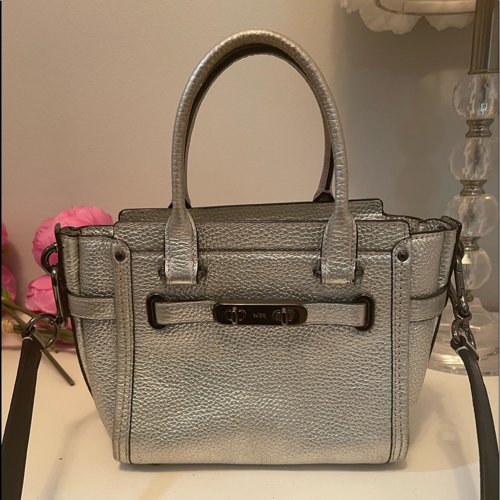 COACH SWAGGER WRISTLET IN silver

color: dark antique nickel silver
